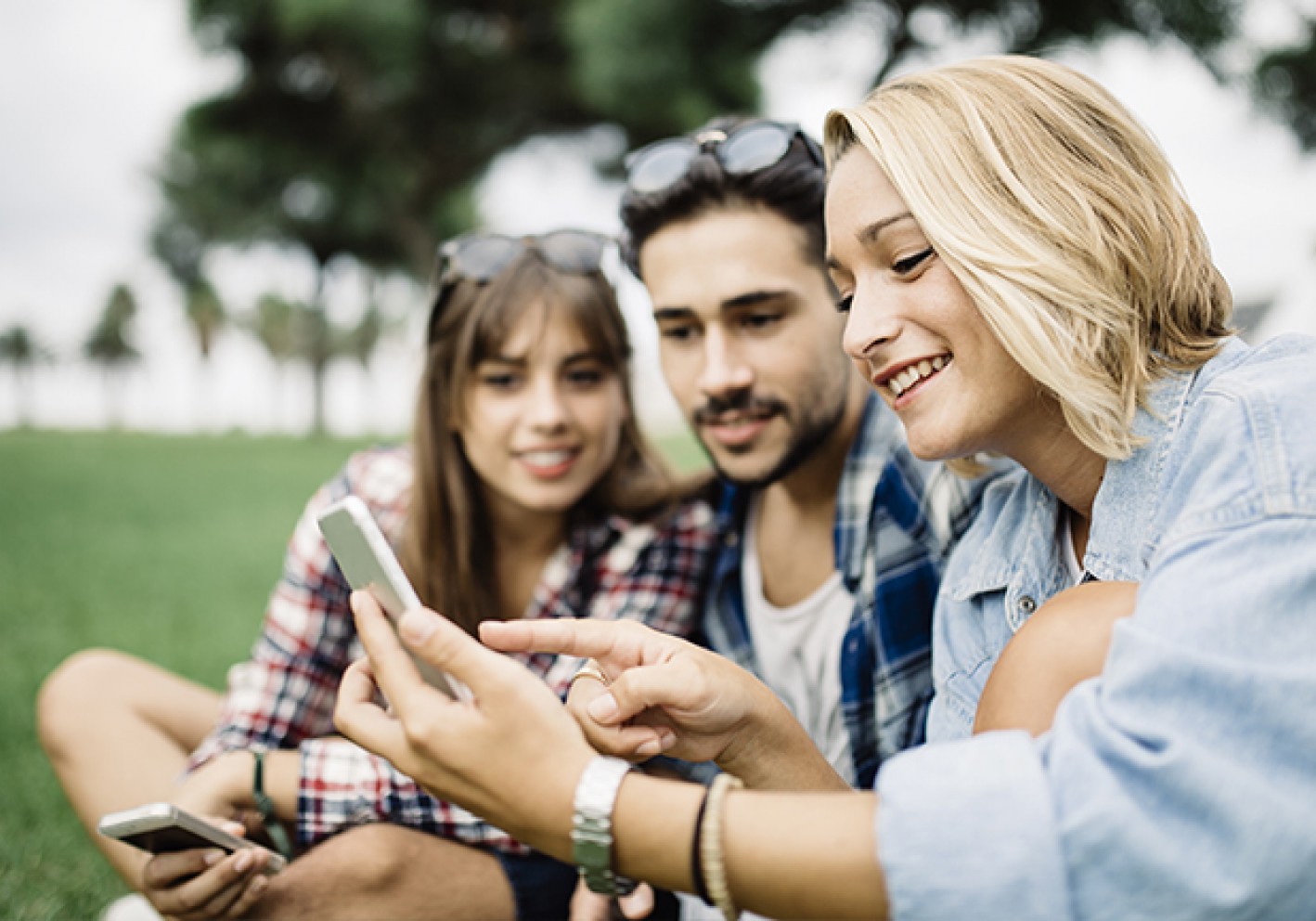 Friends looking at app