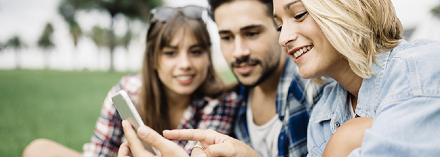 Friends looking at app